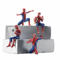 Set of four 8 cm Spider-Man mini figures in sitting, reading and web-shooting poses