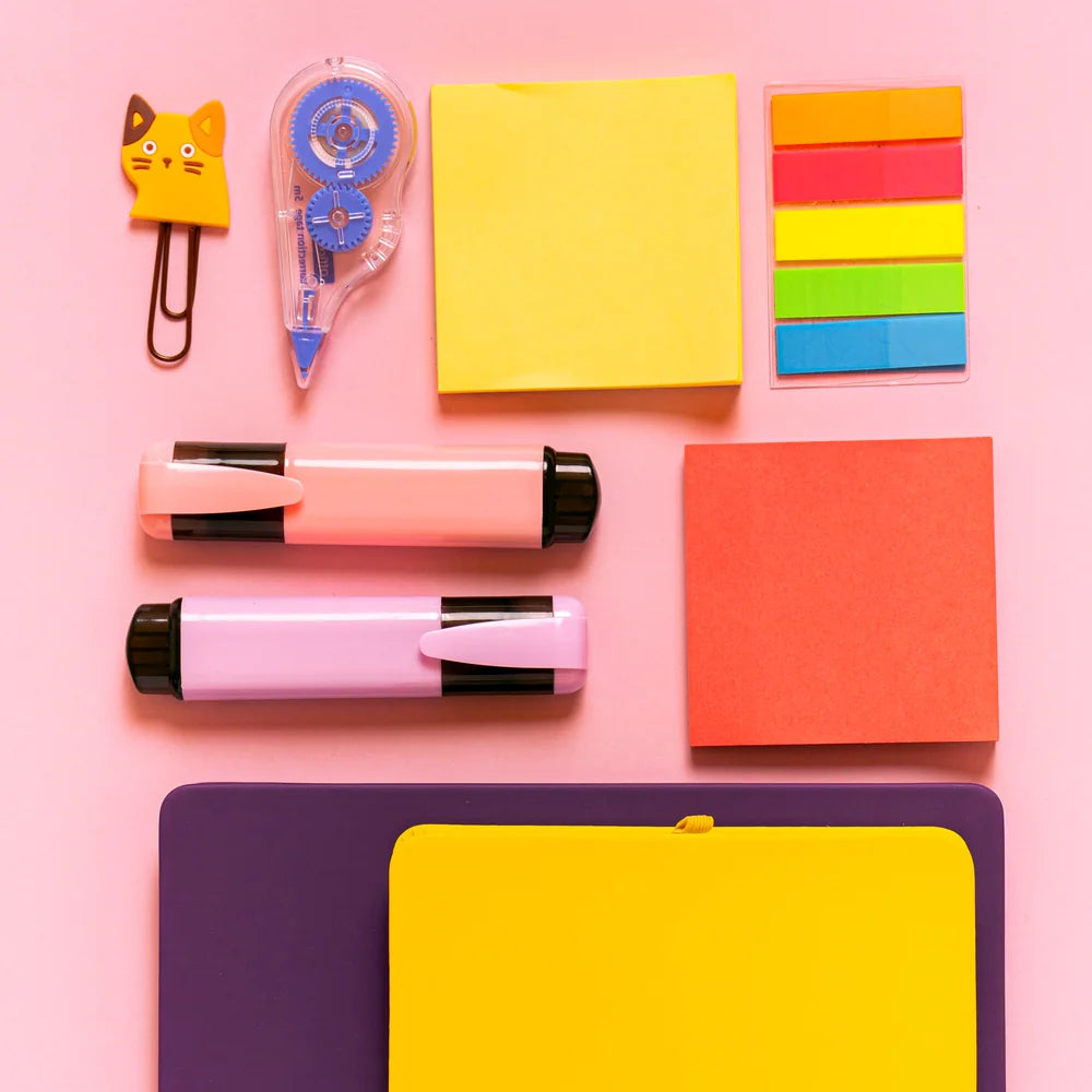 Kawaii stationery on a pink desk